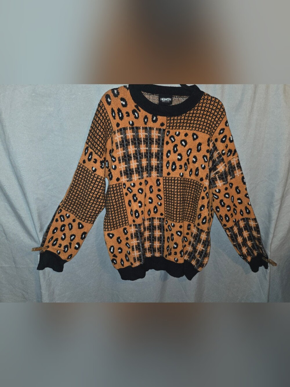 Heimish Women's Burnt Orange and Black Patchwork Animal & Houndstooth Sweater